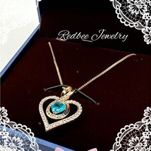 NIB Redbee 18kt GP, Rose gold over s925, "Swiss Blue Topaz" CZ heart necklace!